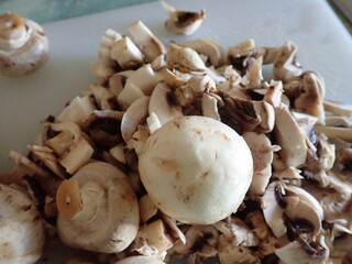 champignons on a white cutting board