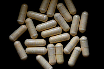 b-complex pills on a dark background, biologically active supplements