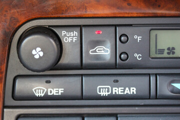 Close up of a vehicle climate control panel