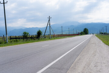 Highway with mountains in the background