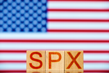 spx. wooden blocks with spx lettering on usa flag background