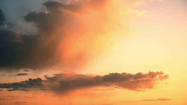 Sunset Cloudy Sky With Fluffy Clouds. Sunset Sky Natural Background