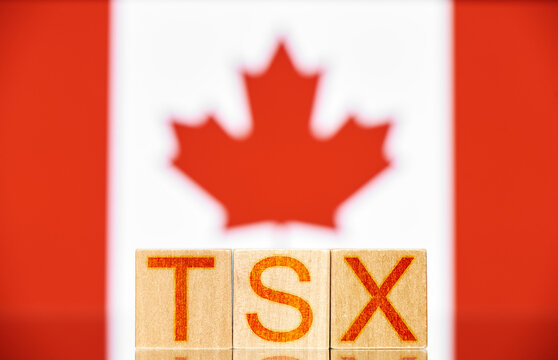 tsx. wooden blocks with tsx lettering on canada flag background