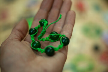 Bracelet decoration on a man's hand. 