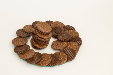 Milky and bitter round shape chocolate Madlen,designed on glass plate.The Sugar Feast or any festival celebration.
