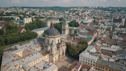 Fototapeta na wymiar Aerial drone shot of city Lviv, Ukraine. Ancient Ukraine Dominican Church. Panorama of old town