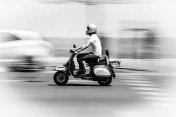 Fototapeta na wymiar Scooter Rider in Madrid