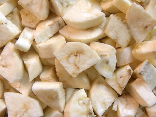 Diced cut raw yellow color cooking plantain banana