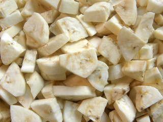 Diced cut raw yellow color cooking plantain banana