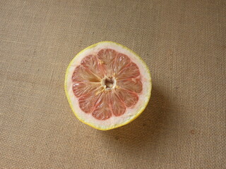 Pink color sliced cut ripe yellow Grapefruit or Citrus paradisi
