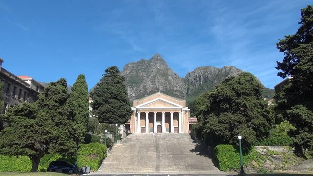 HD sunny day video of spectacular University of Cape Town, its sport grounds, green trees, old buildings and shady alleys in Western Cape, Cape Town, South Africa