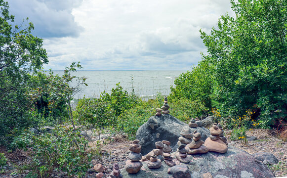 Stones left as decoration memories at this path (Hindens Rev) by the lake Vanern in Sweden.