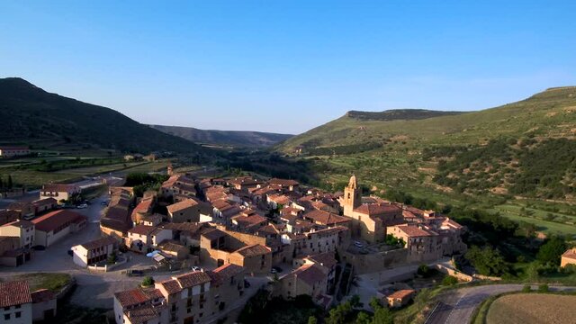 Aerial view of beautiful village in the mountains. Drone Footage