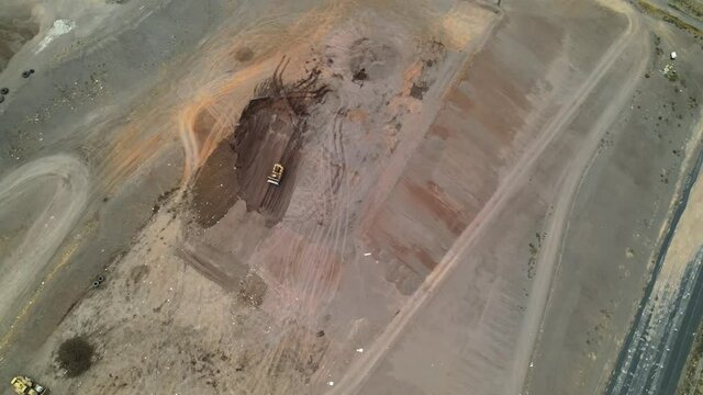 Drone aerial shot 4k. Trash dump site, waste process, landfill site. Landfill compactor bulldozer. 