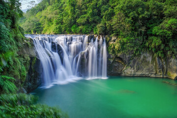 Fototapeta na wymiar Shifen Waterfall - Famous nature landscape of Taiwan, shot in Pingxi District, New Taipei, Taiwan.