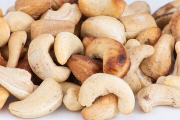 Roasted cashew nut. Texture and background. Close up view.
