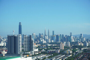 Fototapeta premium Beautiful city skyline of Kuala Lumpur during hot afternoon time. Kuala Lumpur is the capital of Malaysia.