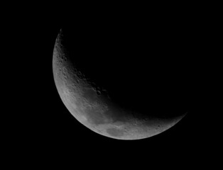 Obraz na płótnie Canvas 25% Waxing Crescent Moon taked with Telescope