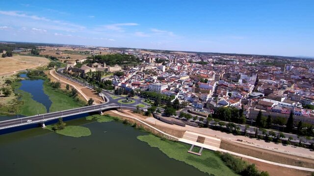 Aerial view of roman bridge in a river of city. Drone Footage