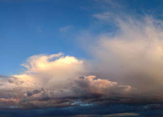 Naklejka na ściany i meble mystical multicolored clouds at dawn
