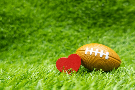 American football, referred to as football in the United States and Canada and also known as gridiron, is a team sport played by two teams  with love on green grass