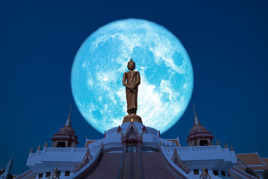 Super Buck moon on night sky in the Asanha bucha day back Sunday Buddha