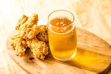 Golden delicious beer and Fried chicken nuggets