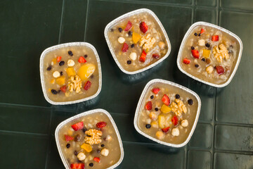 Traditional Dessert Asure,Noah Puding in aluminum bowls,foil containers -take away package-on the...
