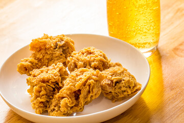 Golden delicious beer and Fried chicken nuggets