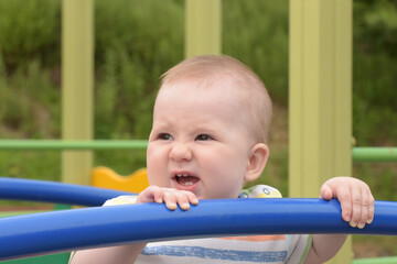 Fototapeta na wymiar Baby on the playground