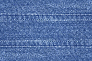 Naklejka premium Blue Denim or jeans fabric with seam texture abstract for background