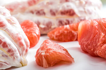 Close-up of red-meat honey pomelo still life