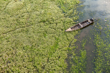 Naklejka premium boat on the river Amazon, Jungle Brazil Manaus