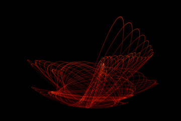 Wonderful and abstract circular and parabolic patterns drawed various light trails with LED ball lights on a dark back ground,Pendulum. 