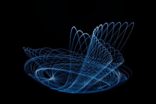Wonderful and abstract circular and parabolic patterns drawed various light trails with LED ball lights on a dark back ground,Pendulum. 
