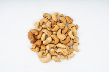 Fototapeta na wymiar Tasty cashew nuts on white background.