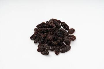 dried raisins on white background.