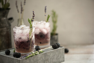 cocktail with berries and lavender syrup