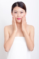 Bust portrait of female bath towel with light makeup