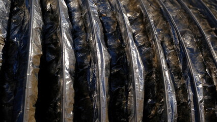 
Rusty and painted metal surface. Defocused and blurred background