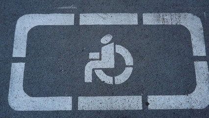 drawing on the asphalt Parking for the disabled