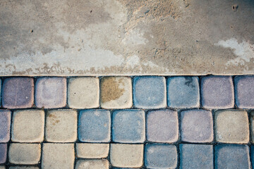 Perspective View Monotone Gray Brick Stone Pavement on The Ground for Street Road. Sidewalk, Driveway, Pavers, green grass