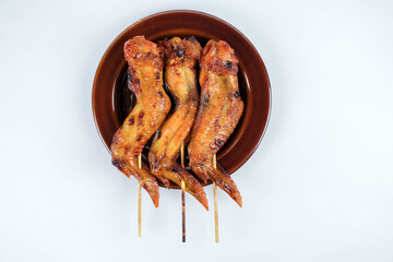 Chicken wing skewer grill photo on white background