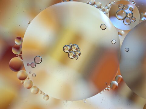 abstract background with yellow gold bubbles oil in water ,macro image ,sweet color for lovely card ,white  shiny droplets for web design