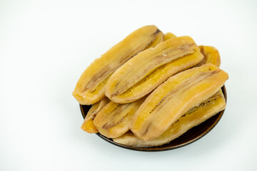 Fresh banana slice stacking on dish photo on white background