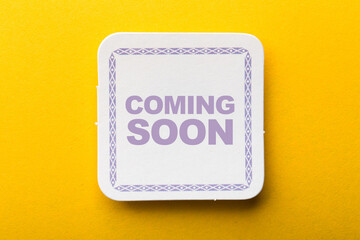 Coming Soon Label On Yellow Background