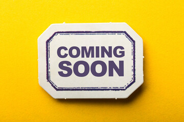 Coming Soon Label On Yellow Background