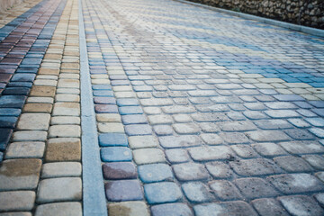 Perspective View Monotone Gray Brick Stone Pavement on The Ground for Street Road. Sidewalk, Driveway, Pavers, green grass