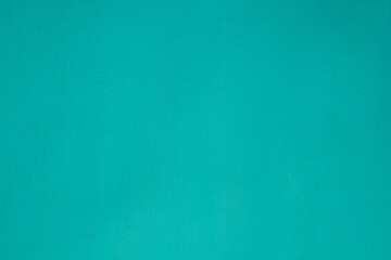 Turquoise color paper texture background. Texture of light green cardboard closeup