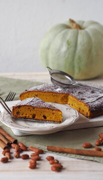 Pumpkin muffin on a white background.Home cooking. Rustic cooking style.